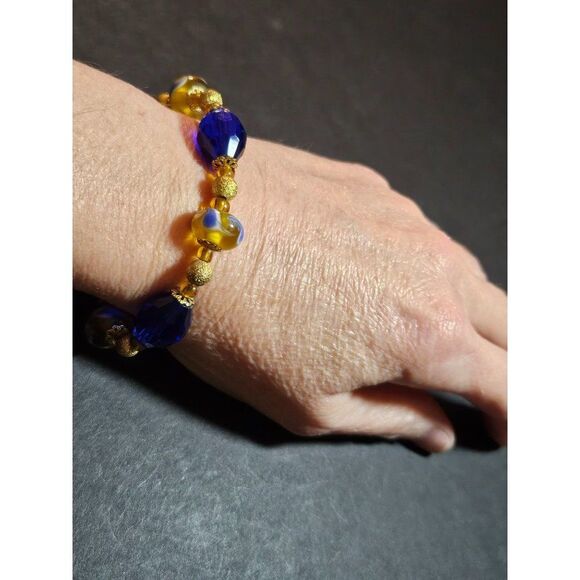 Jewelry - Blue and gold beaded bracelet